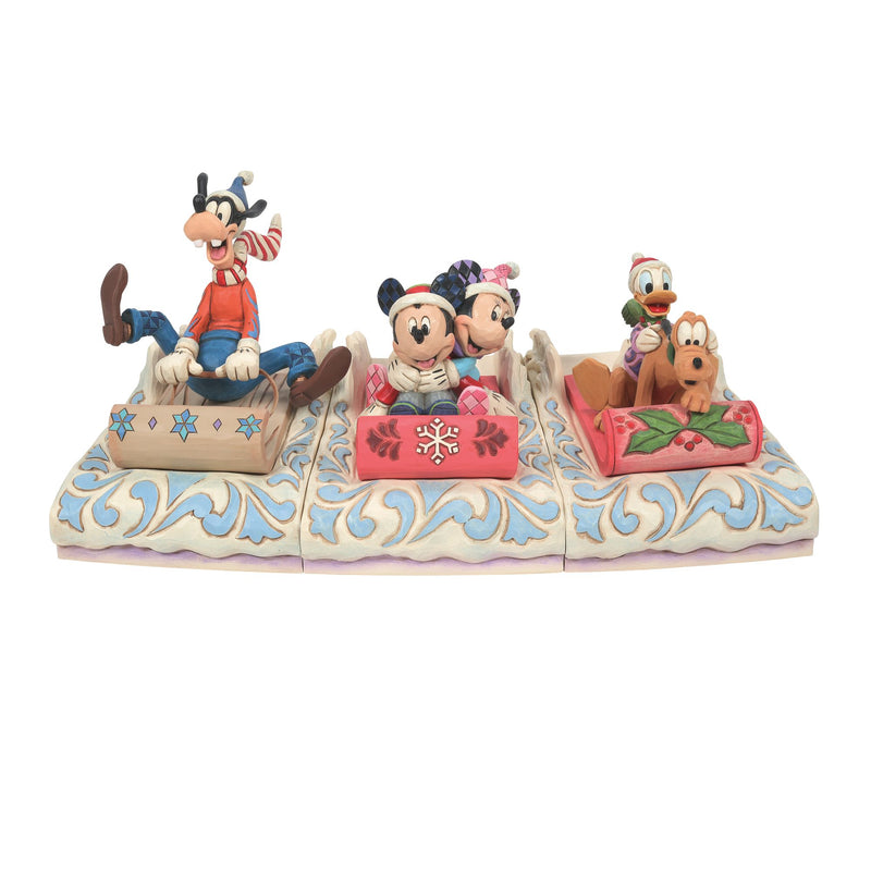 Figurine Donald et Pluto font de la luge - Disney Traditions